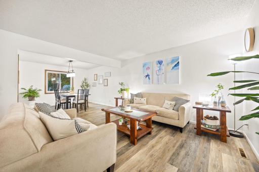 Off the foyer you are greeting with the modern and large light filled living / dining space.