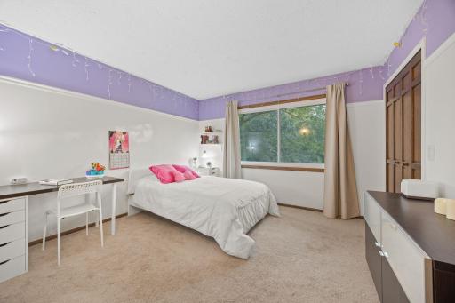 3rd bedroom on the upper level. Also spacious with great closet space.