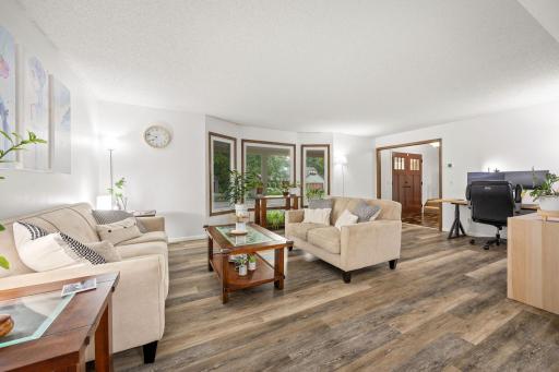 Updated bay windows, fresh paint, updated flooring. A great place to hang out.