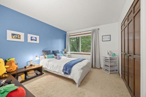 2nd bedroom on the upper level with ample closet space.