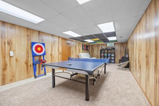 In the lower level you'll find a large recreation room great as game room, man cave or for movie nights.