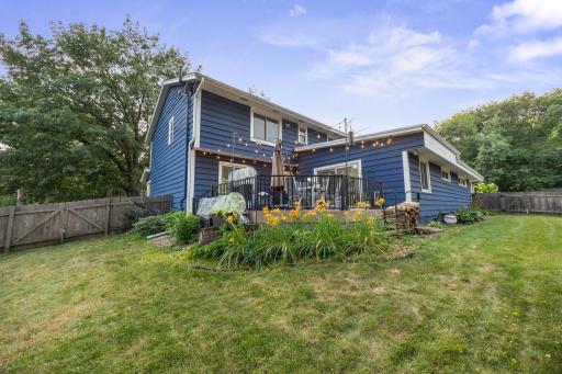 Cozy fully fenced backyard. Private to the neighbors and with the cozy deck in the heart of it all.