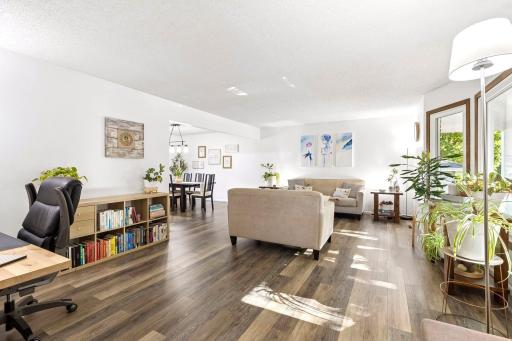 As you walk in, you are greeting with the modern and large light filled living / dining room.