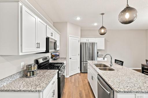 Granite countertops, and stainless steel appliances