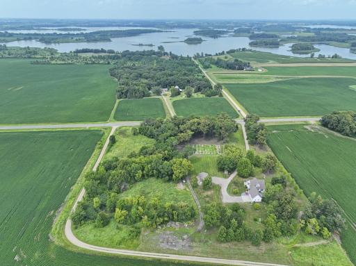 The home is in the foreground and shows the close proximity to Cedar Lake! Just down the driveway and across the road, and you could be fishing, kayaking, canoeing!