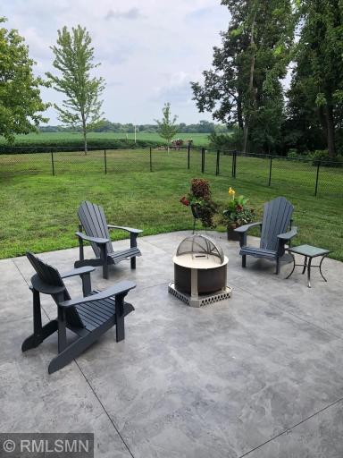 Ample-sized patio right off of the kitchen! Note the fenced-in area!