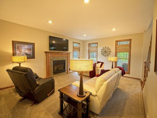 Once you cross the threshold from the porch, you enter a very inviting living room, complete with gas fireplace for cozy winter nights!