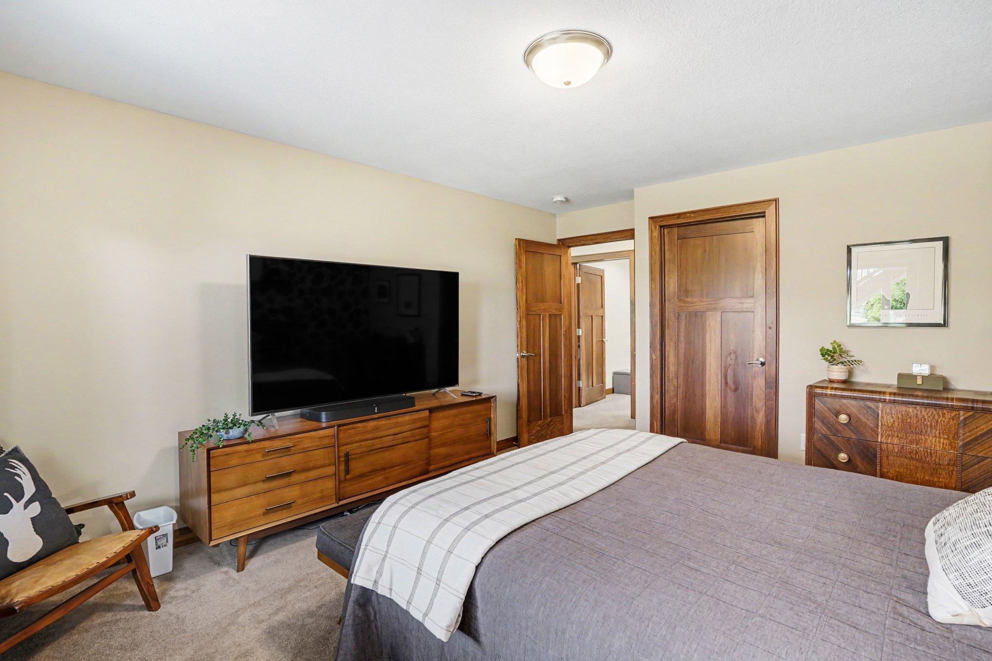 Another view of the 2nd bedroom shows the mission style doors which are throughout the home.