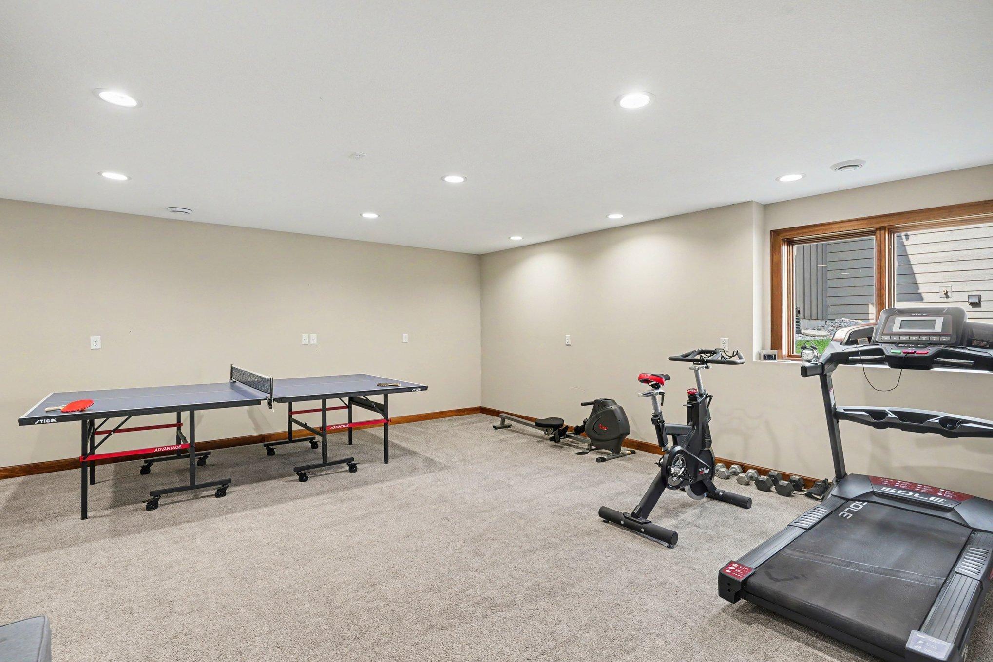 The 4th bedroom is huge and would be a good space for a craft or exercise room. There is a large walk-in closet, under the stairs storage and access to the utility/storage room from this bedroom.