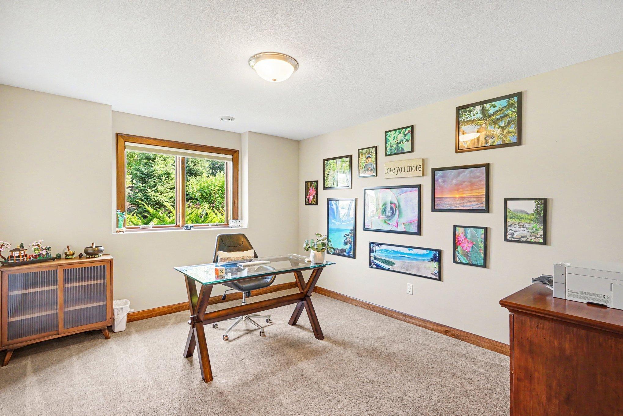 The third bedroom is being used as an office.
