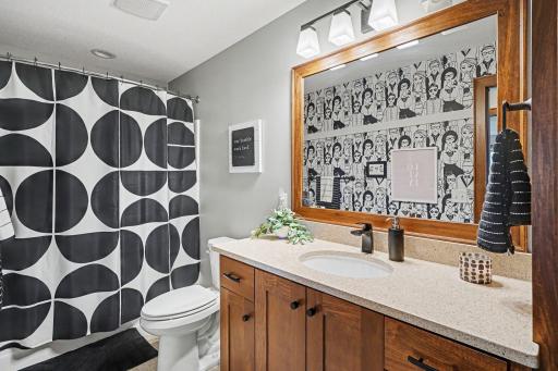 The full lower level bathroom finishes off this level.