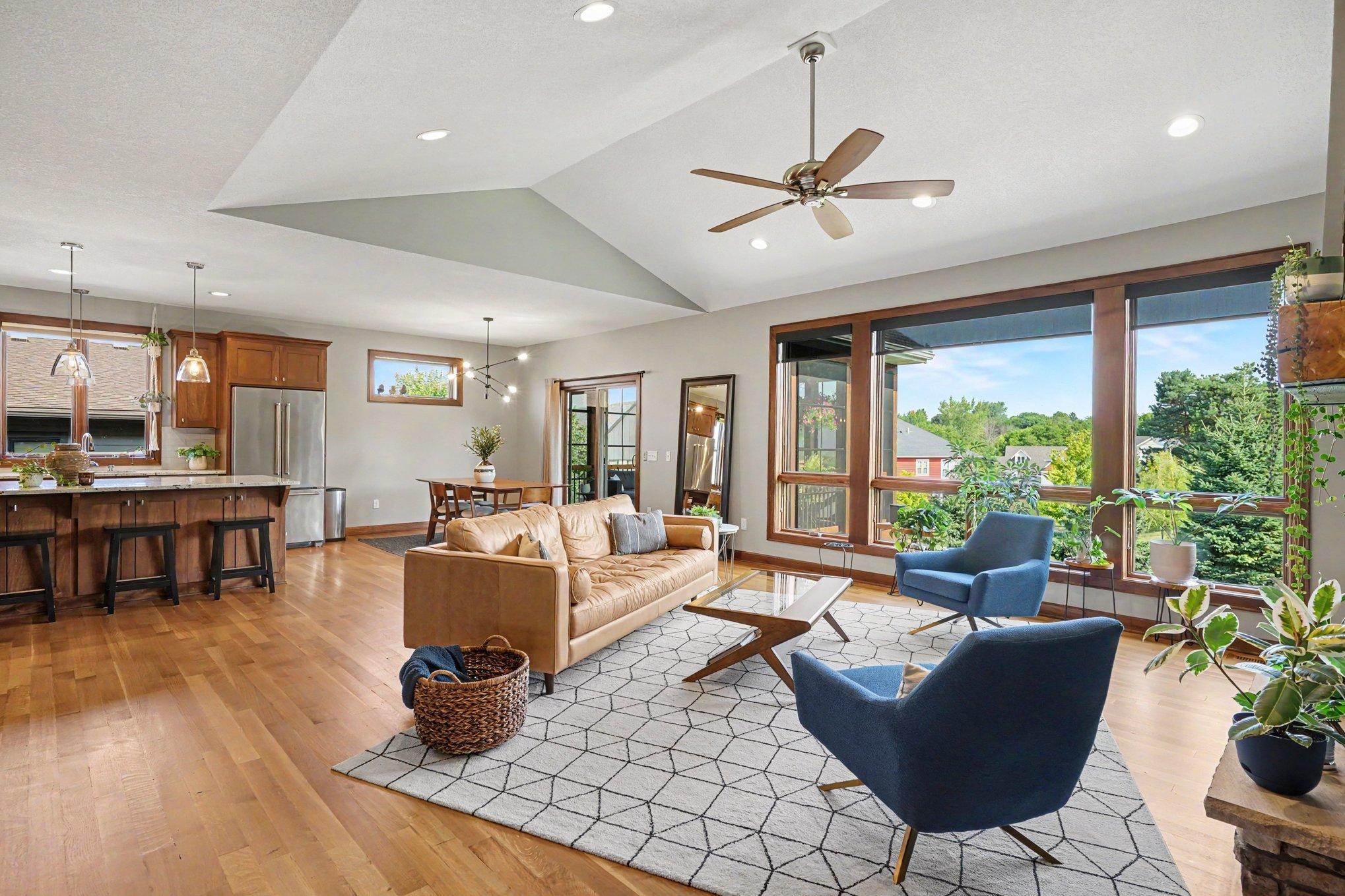 You'll enjoy the triple pane windows facing the private back yard all year long. New roller blades were added.