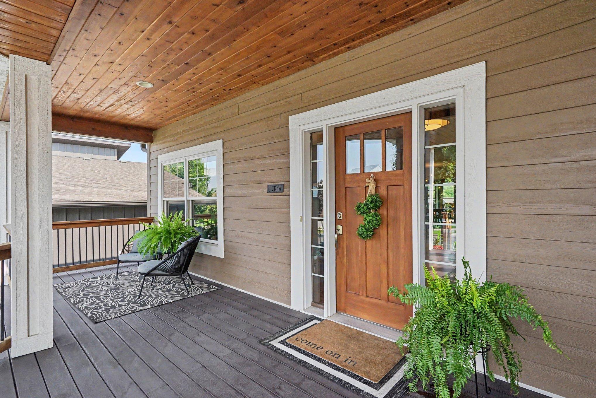 The large maintenance free porch has plenty of space for seating.