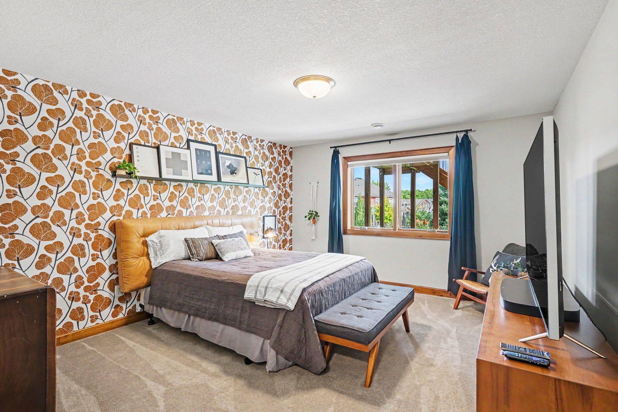 The 2nd bedroom has a large closet and faces the back of the home.