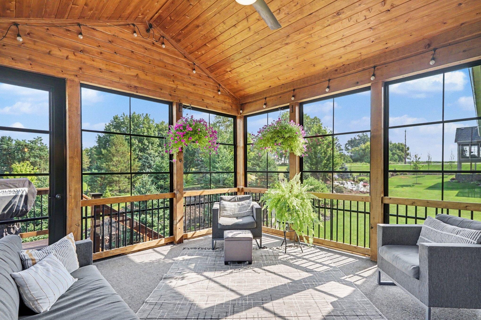 The sunroom has an indoor/outdoor carpet pad, a vaulted ceiling with a fan and screens. Sellers ordered vinyl windows so this room could be used earlier in the Spring and later in the Fall.