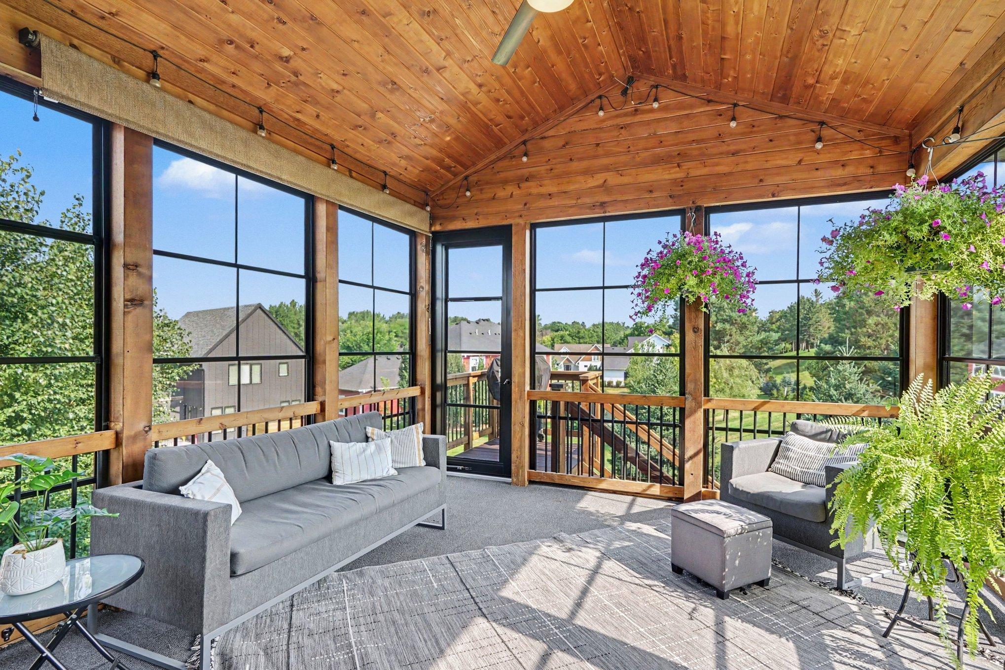 The sunroom has access to the deck landing for your grill and a stairway leading to the back yard.