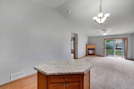 Center island overlooking both the kitchen and dining/living rooms.