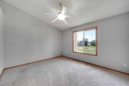 Owner's suite has vaulted ceilings and big windows looking out back/south.