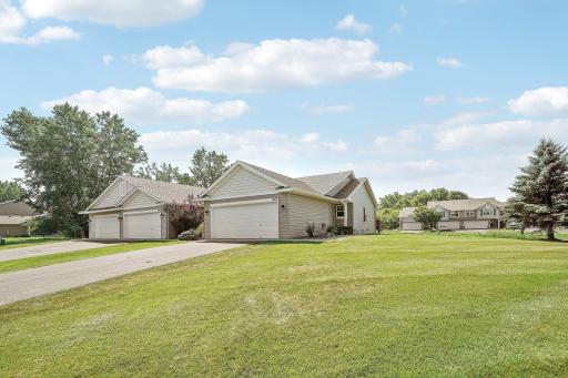 Large corner lot provides a massive, plush green yard to enjoy.