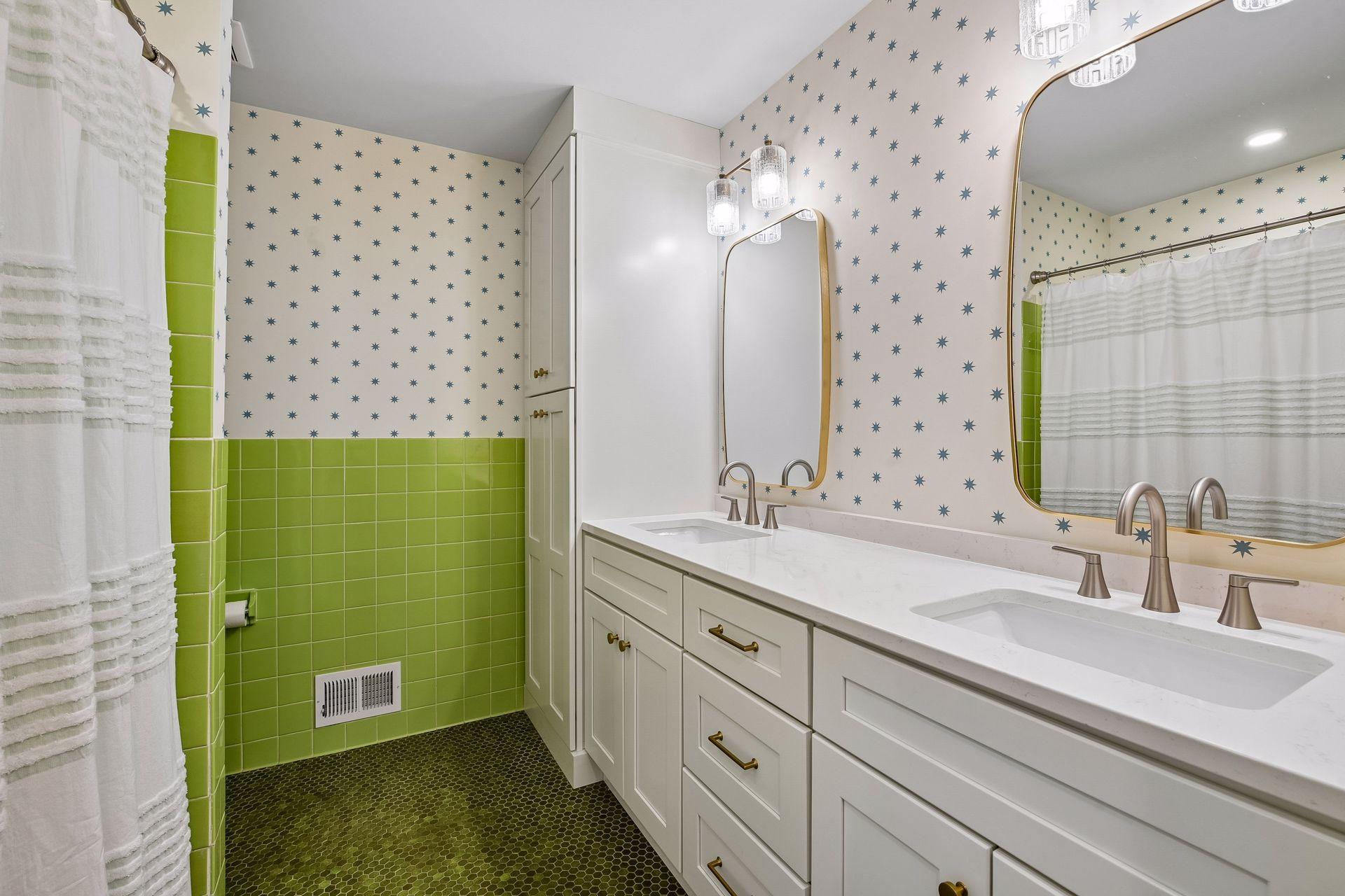 Updated bathroom pairs designer finishes with generous vanity storage