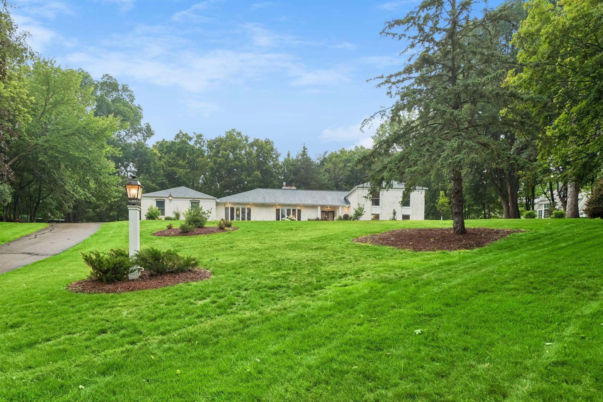 Newly landscaped grounds create a lush, picturesque setting