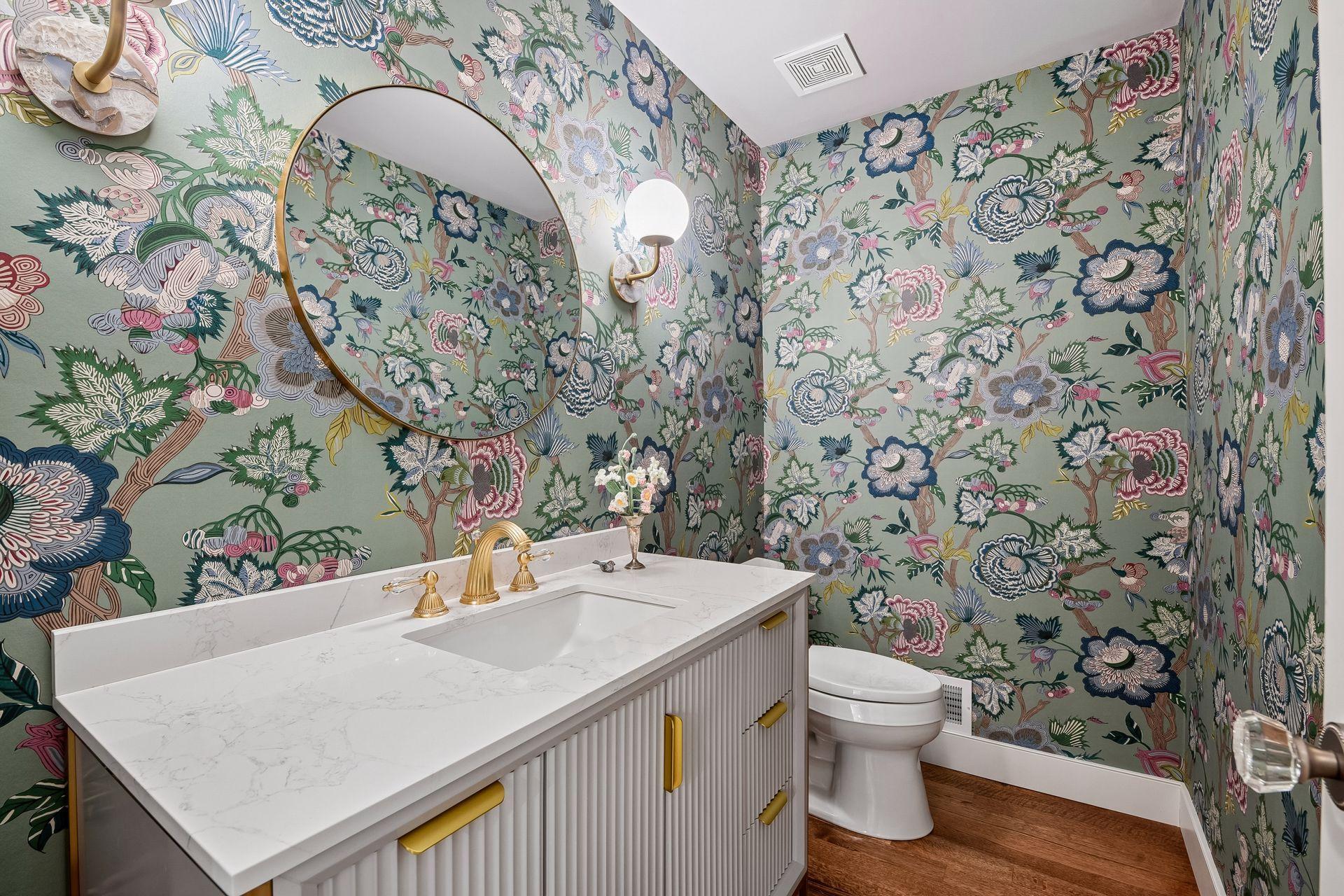 Designer wallpaper and premium finishes elevate this stylish powder room