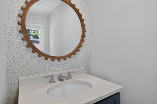 The second 1/2 bathroom located off of the mudroom.