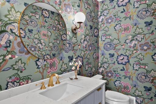 One of two main level 1/2 bathrooms located near the entryway