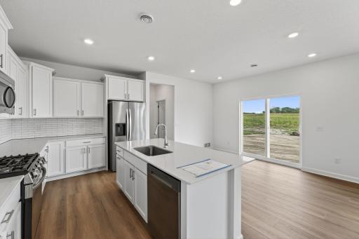 (Photo of a similar home, actual finishes may vary)