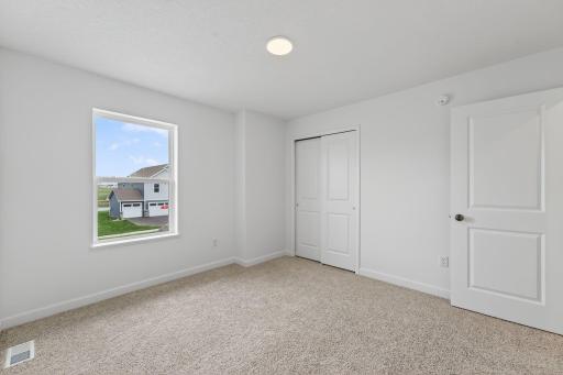 (Photo of a similar home, actual finishes may vary)