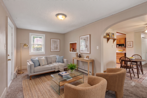 Living room not completely changed only virtually staged