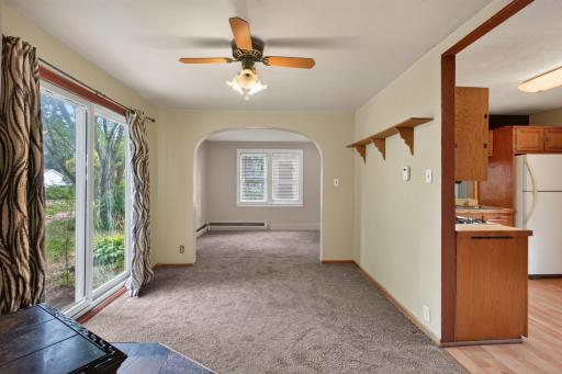 Original picture of dining area to living room where not one structural thing was changed