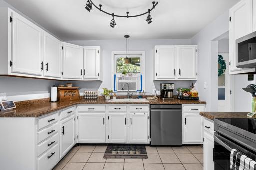 Newer S.S appliances and freshly painted cabinets