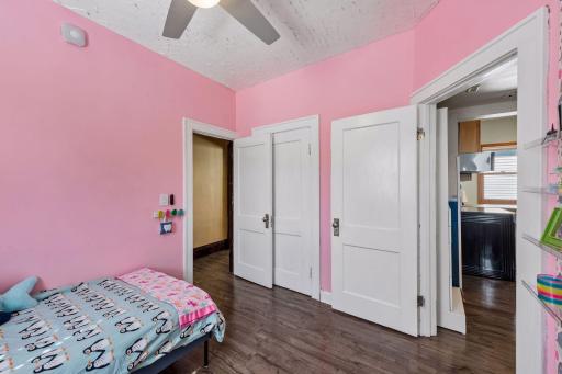 A dedicated closet provides convenient storage in the second bedroom.