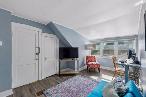 A private entrance and large closet add convenience and valuable storage to the upper-level apartment.