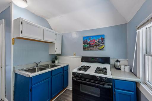 The apartment has its own full kitchen with a gas range, double sink and ample cabinet and counter space.