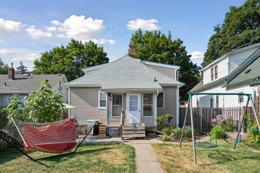The fully fenced backyard offers room to relax, garden and play, with convenient access to the home from the rear.