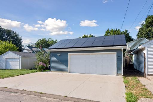 The garage and solar panels are only about five years old. The cement slab was also recently redone and there is room enough to park an additional vehicle on the left side of this photo.