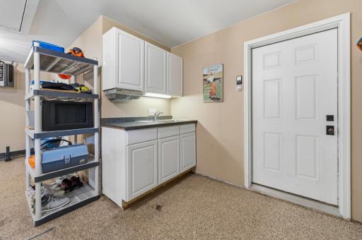 Additional workspace and cabinetry make the garage as functional as it is spacious.