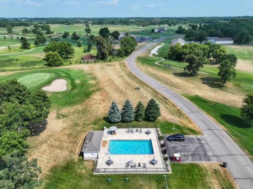 Spend sunny afternoons relaxing by the heated association pool overlooking the course.