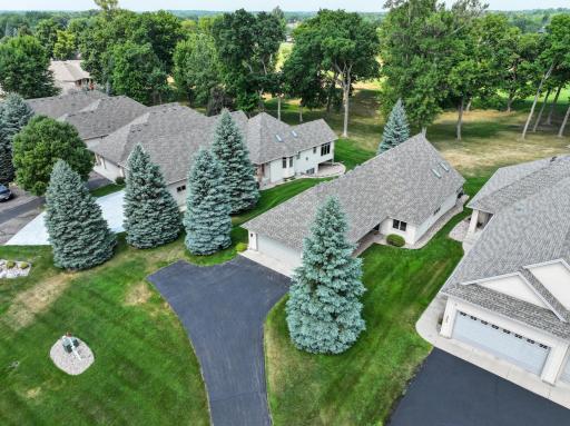 Aerial views showcase the beautifully maintained Geneva Estates community.