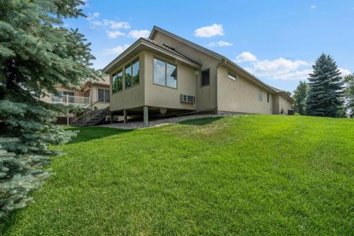 Mature trees and thoughtful landscaping create timeless curb appeal.