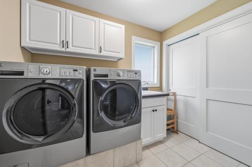 The dedicated laundry room adds everyday convenience.