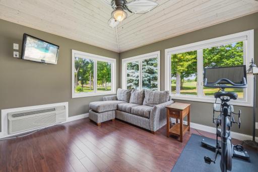 Expansive windows create the perfect place to relax and take in the scenery.