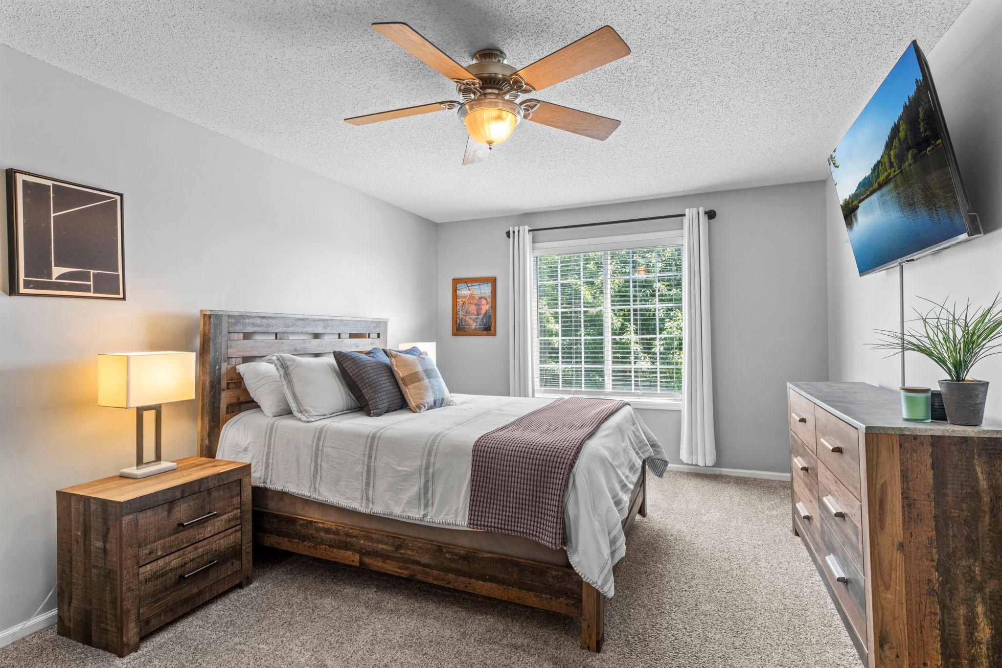 The spacious primary bedroom features a generous 9x7 walk-in closet and direct access to the full bathroom.