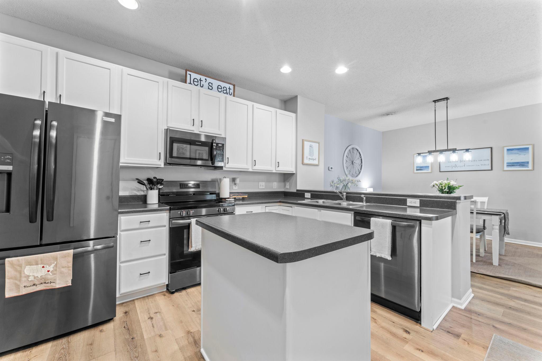 The kitchen is designed for both everyday living and gathering.
