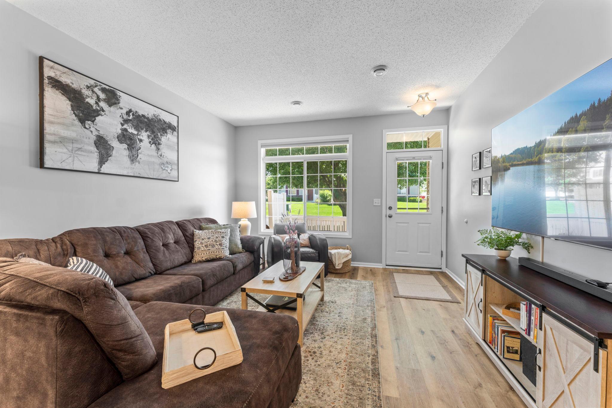 The new flooring creates a sleek look that is easy to care for and flows naturally into the rest of the main level.