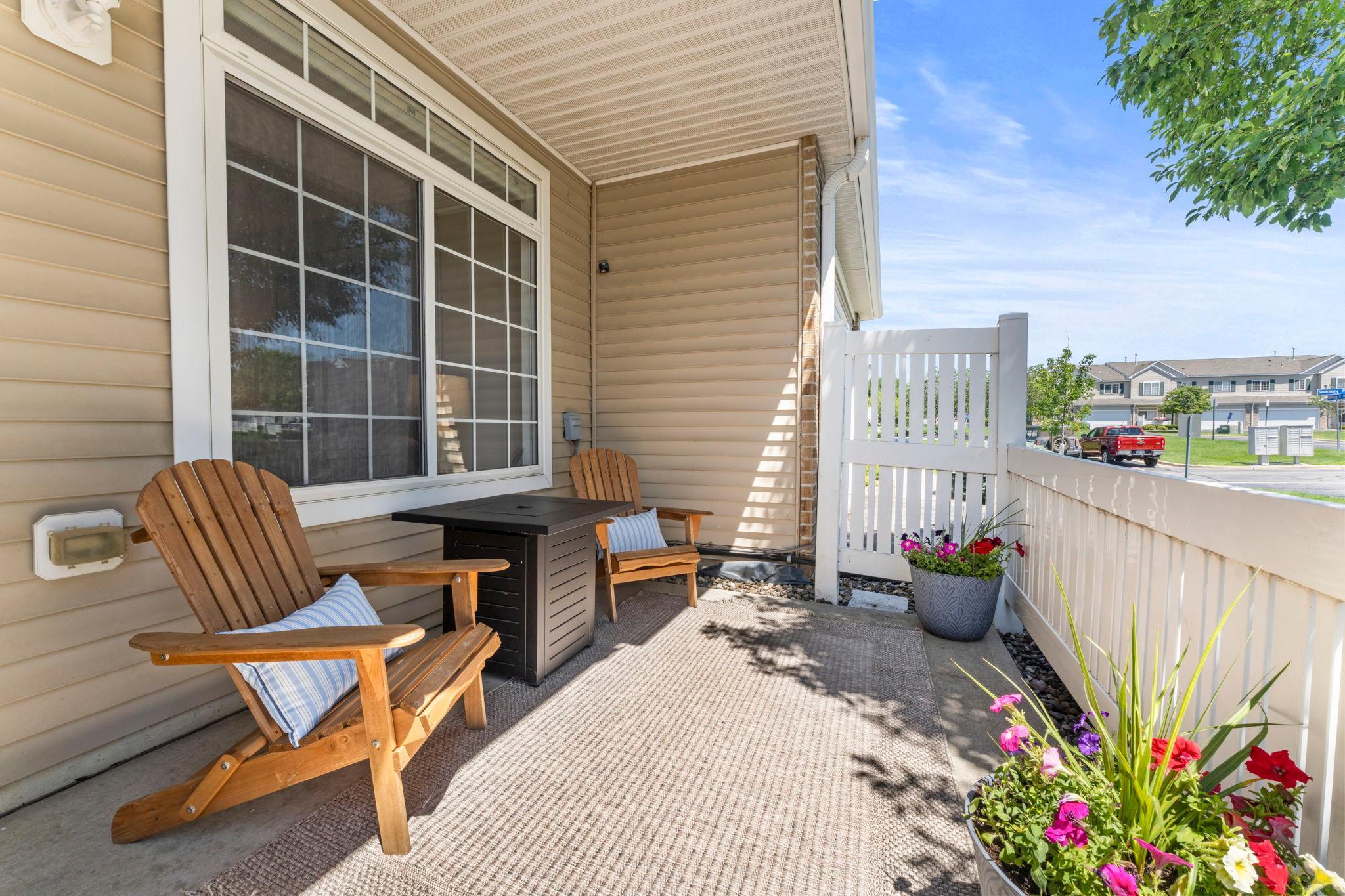 Step outside to your own private patio, a simple spot to enjoy fresh air, morning coffee, or dinner outdoors. An attached 2-car garage provides welcome protection from Minnesota weather, along with built-in shelving for additional storage.