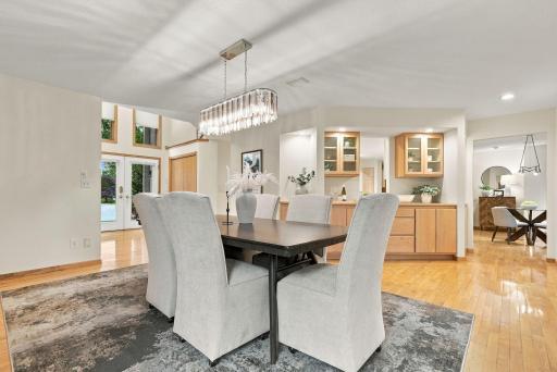 Custom cabinetry provides beautiful storage and serving space just off the dining area.