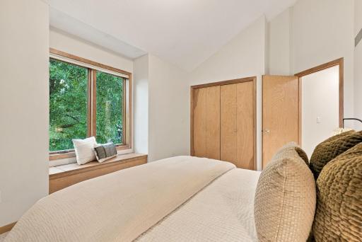 Generous windows and closet storage make this room highly adaptable.